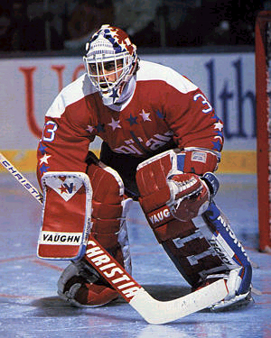 Don Beaupre of the Minnesota North Stars Alumni blocks a shot from